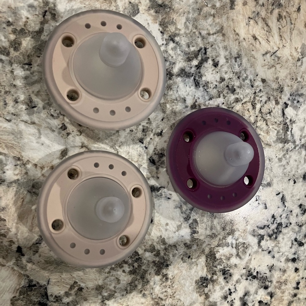 Three Ninni Co pacifiers